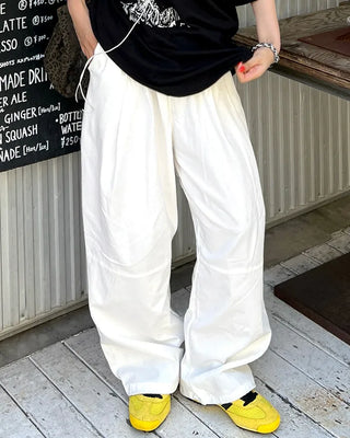 Cotton two-pleat wide-leg pants with key loop.
