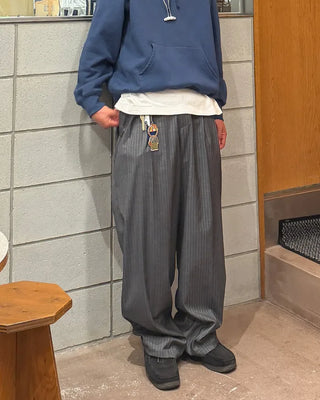 Two-pleat striped slacks