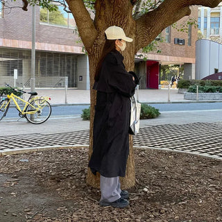 Oversized trench coat with sleeve belt