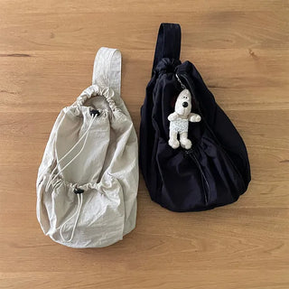 Drawstring pocket shoulder bag