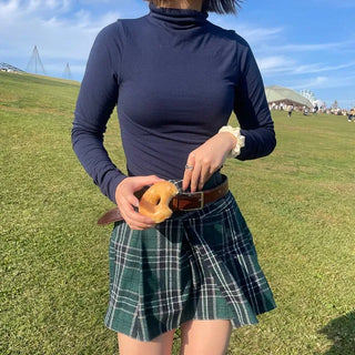 Checked pleated mini skirt
