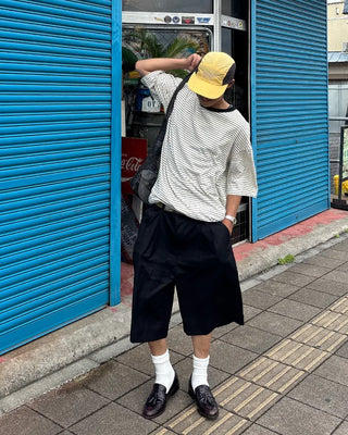 Double-pleated Bermuda shorts