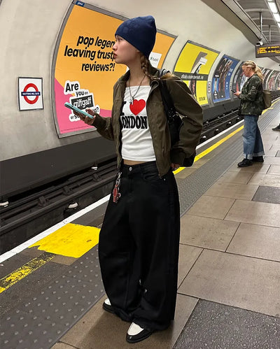 Coated black baggy denim pants