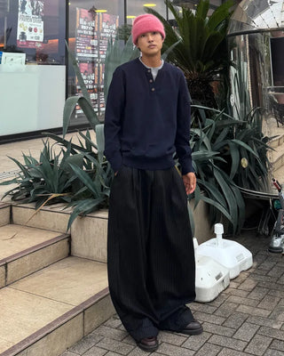 Double-pleated striped slacks