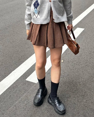 Belted corduroy pleated mini skirt