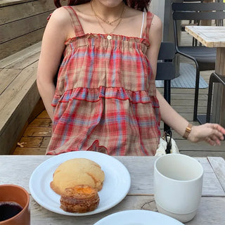 Checked sleeveless blouse
