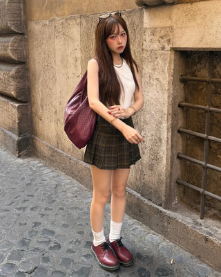 Checkered button pleated mini skirt