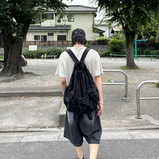 Multi-pocket string backpack