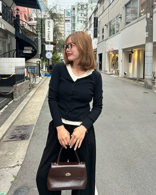 Sleeveless layered cardigan