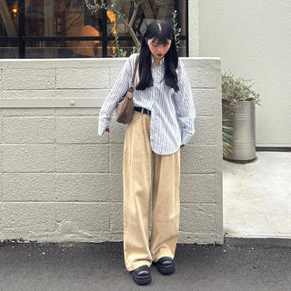 Tucked wide-leg pants