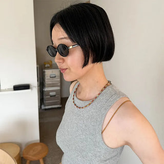 Tinted oval sunglasses