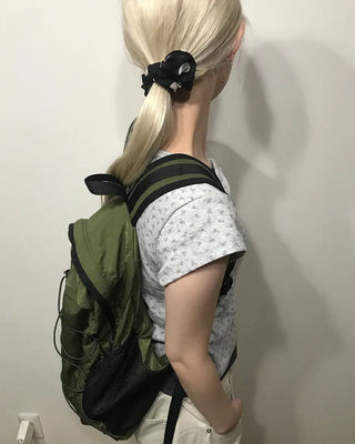 Nylon backpack with side pockets