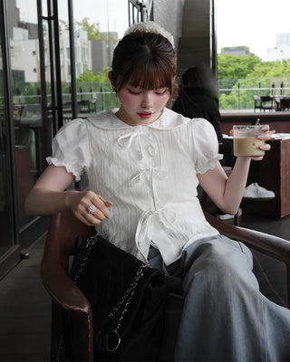 Round collar ribbon detail blouse