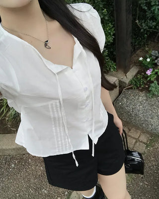 Pintuck puff sleeve ribbon tie blouse