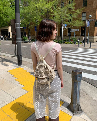 Shirring flap backpack