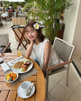 Embroidered ruffle blouse