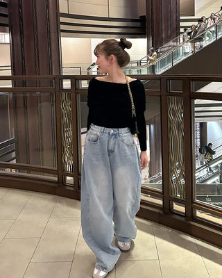 Wide-leg denim with side pleats