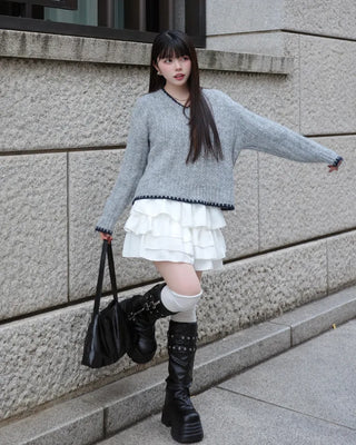 V-neck two-tone cable knit sweater