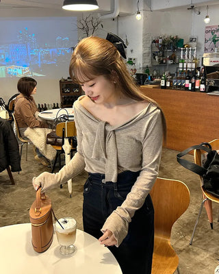 Tie-off shoulder knit