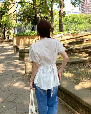 Collarless tie blouse