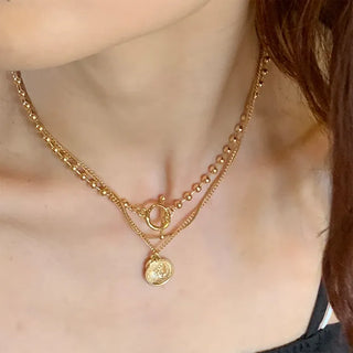 Layered buckle necklace