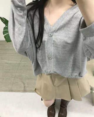 Three-button oversized cardigan