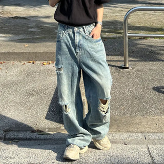 Distressed wide-leg denim pants