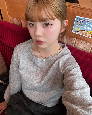 Side-button cropped knit