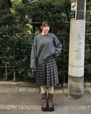 Checked pleated midi skirt