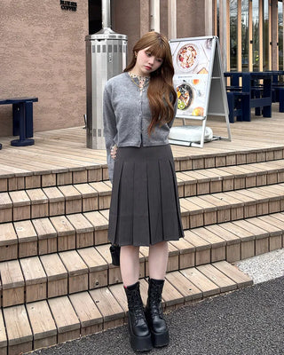 Belted pleated midi skirt