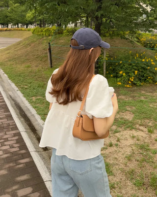 Voluminous peplum blouse