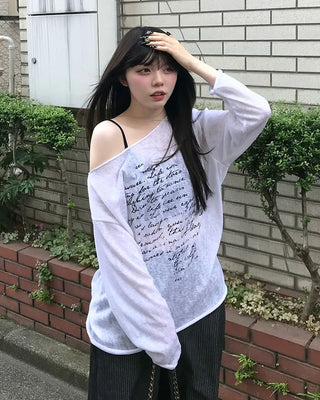 Off-shoulder lettering knit