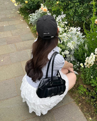 Two-pocket half-moon shoulder bag