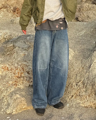 Pointed denim pants with contrasting panels