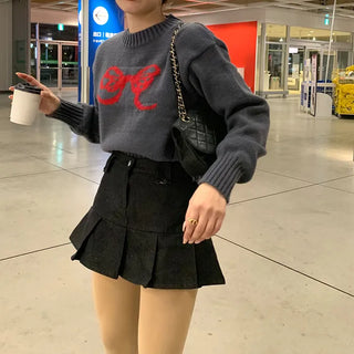 Pleated denim mini skirt