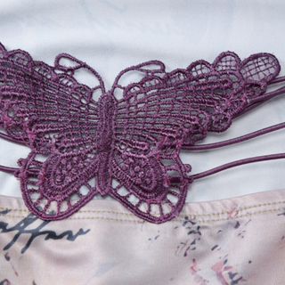 Cross back v neck spaghetti strap print mini dress