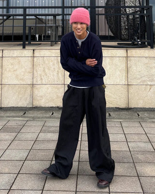 Double-pleated striped slacks