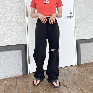 Distressed black denim pants