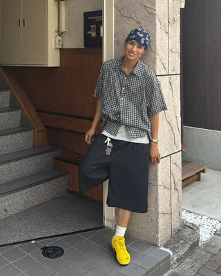 Double-pleated Bermuda shorts