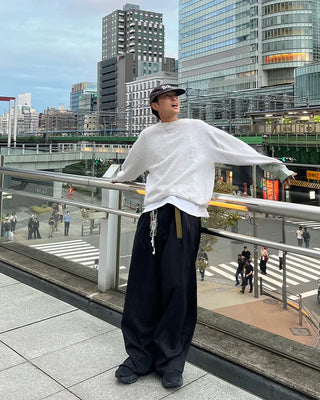 Double-pleated striped slacks