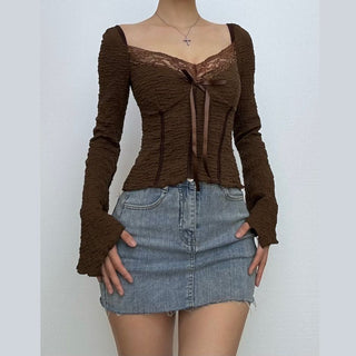 Long sleeve textured bowknot lace hem top