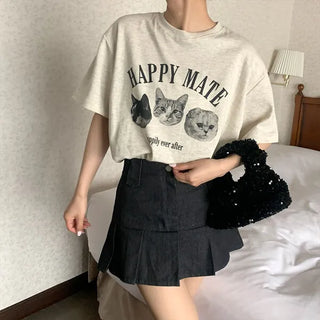 Pleated denim mini skirt