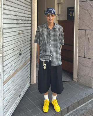 Double-pleated Bermuda shorts