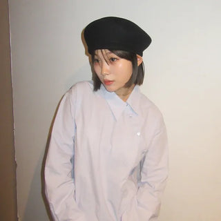 Cross-button blouse