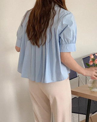 Feminine pleated blouse