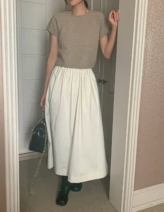 Suede peach cotton pocket elastic long skirt