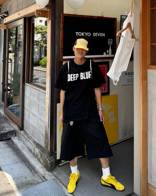 Double-pleated Bermuda shorts