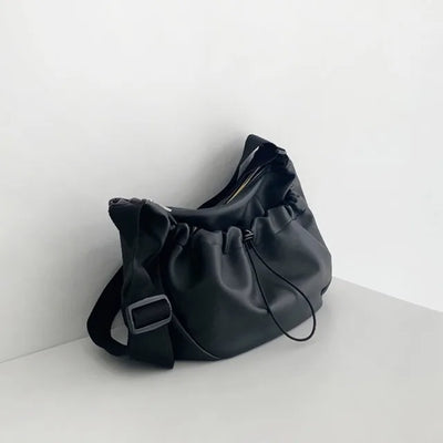 Leather String Pocket Zip-Up Crossbody Bag