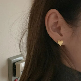Heart-shaped gold earrings