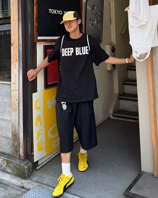 Double-pleated Bermuda shorts